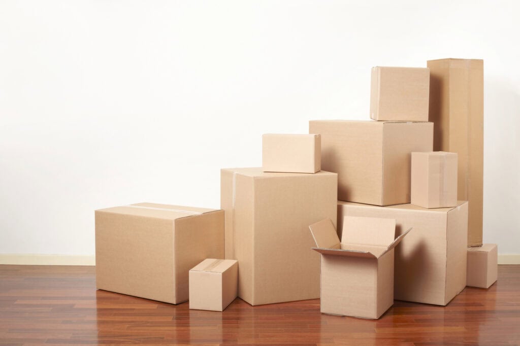 Differently sized cardboard boxes on the floor